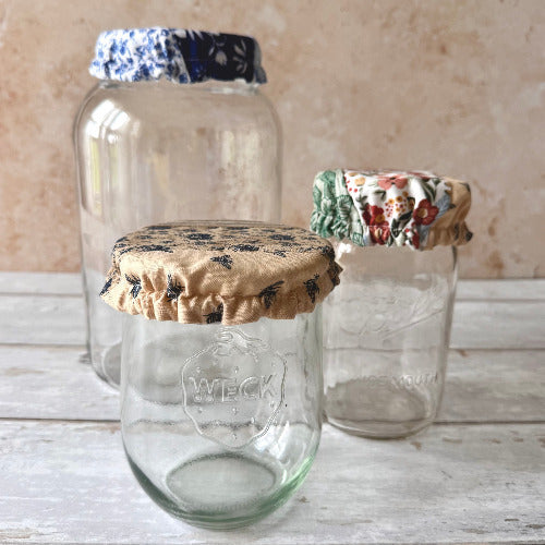 Natural farm jar covers by Five Oaks Farm, showcasing rustic fabric covers for preserving jars.