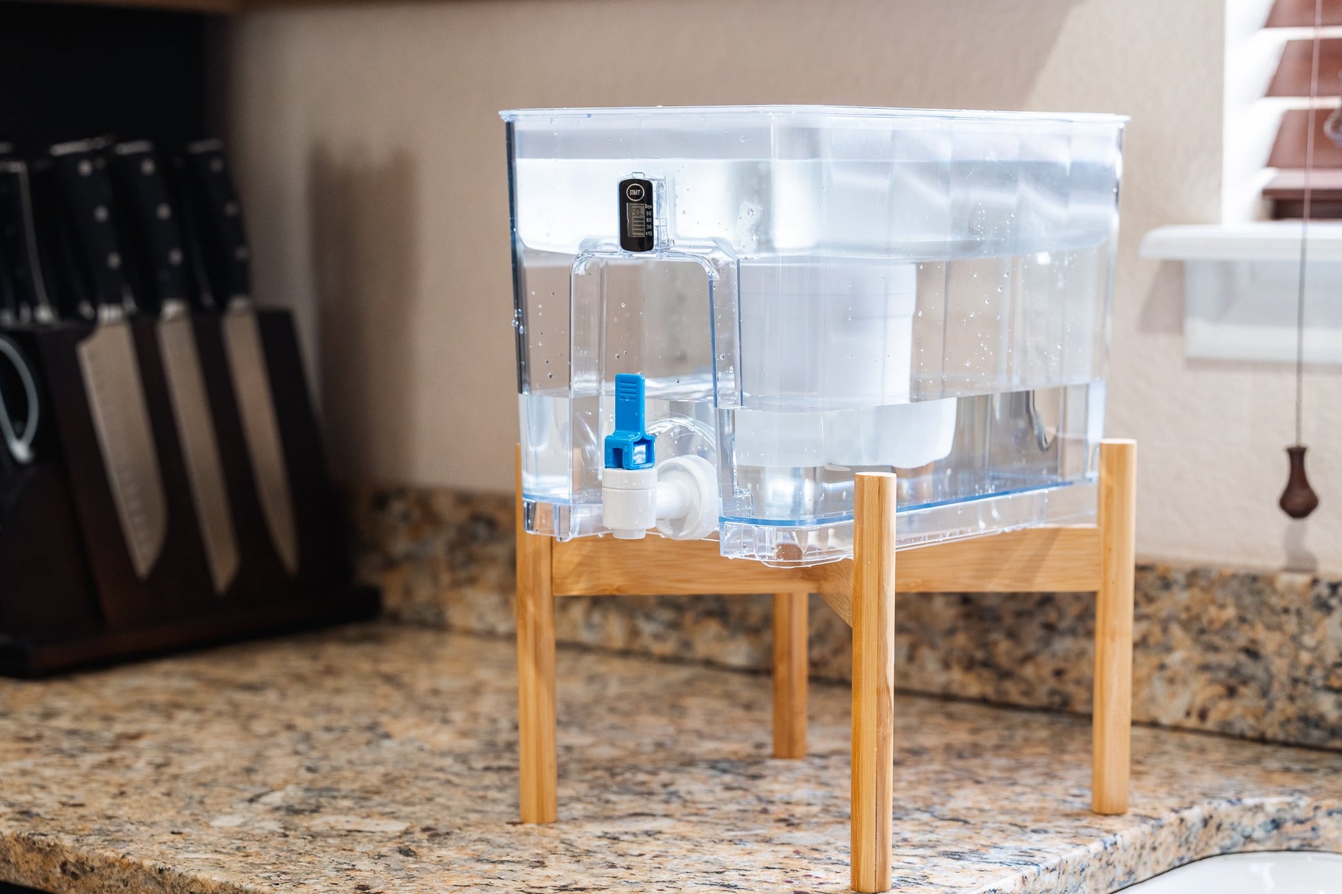 Epic Water Filters Pure XP Dispenser in red, designed to reduce fluoride and PFAS from drinking water.
