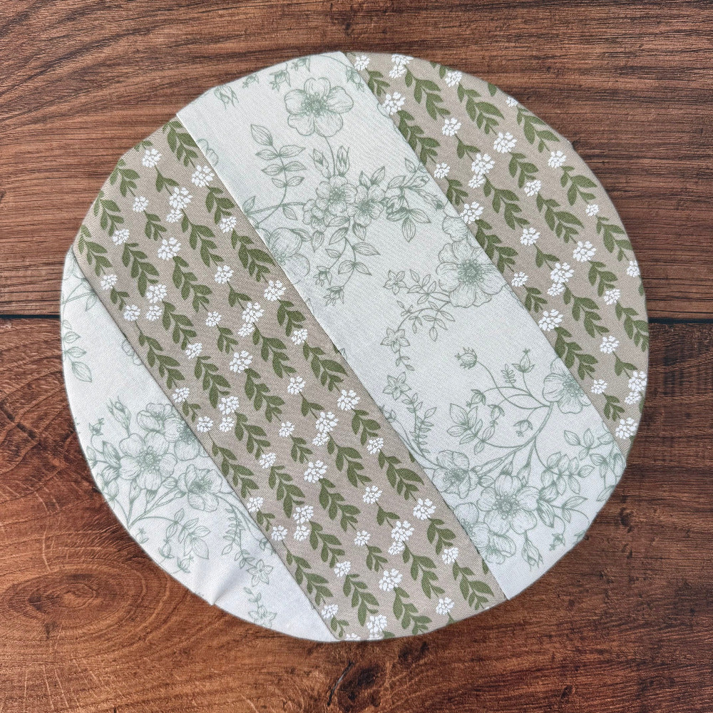 Small bowl and banneton covers from Five Oaks Farm, made for bread proofing and baking, with fabric covers in natural tones.