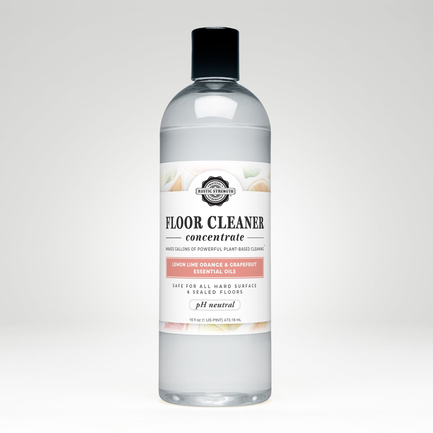 A clear plastic bottle of Rustic Strength Floor Cleaner Concentrate | Lemon, Lime, Orange & Grapefruit, with a white label; a non-toxic cleaner for hard surfaces and sealed floors made with essential oils.