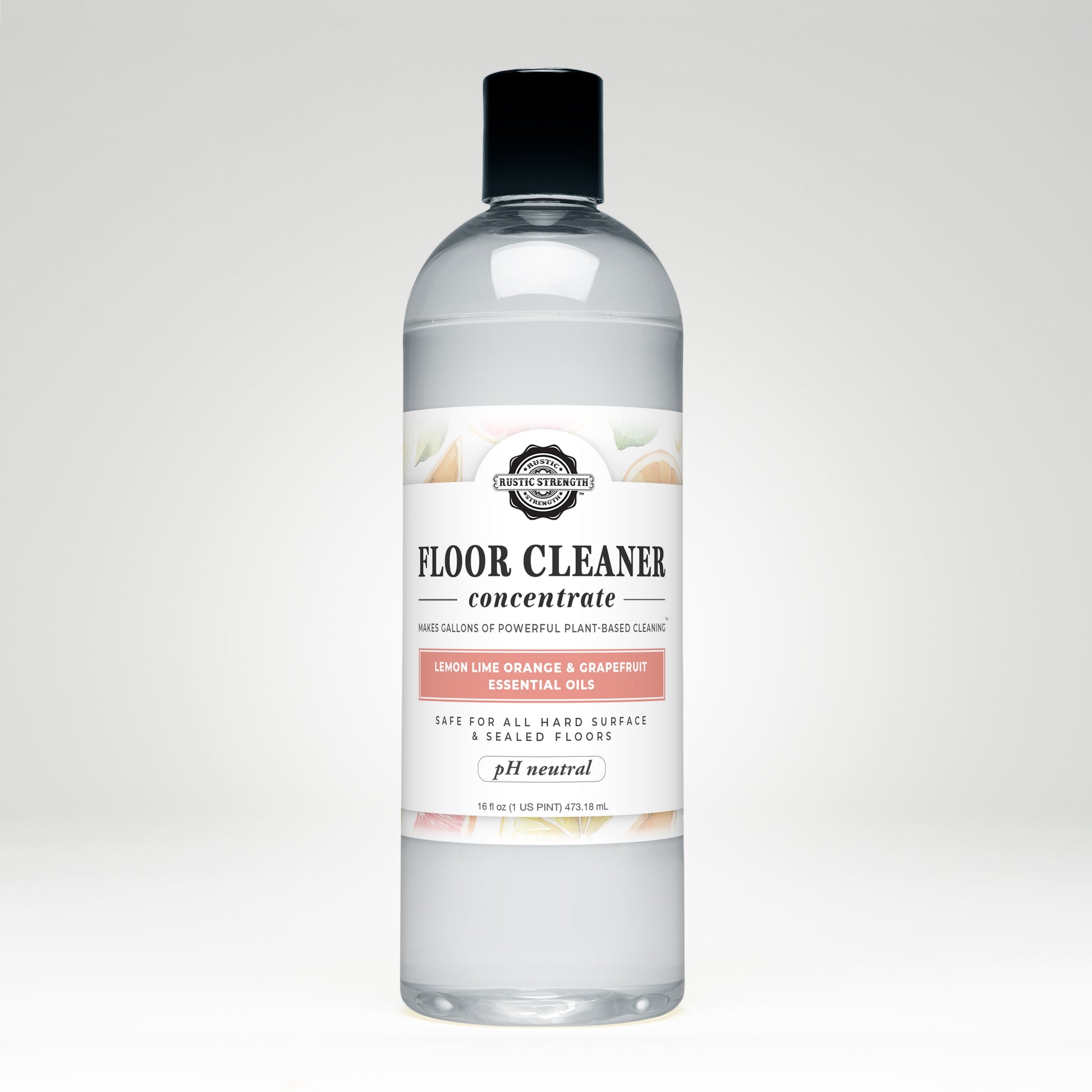 A clear plastic bottle of Rustic Strength Floor Cleaner Concentrate | Lemon, Lime, Orange & Grapefruit, with a white label; a non-toxic cleaner for hard surfaces and sealed floors made with essential oils.