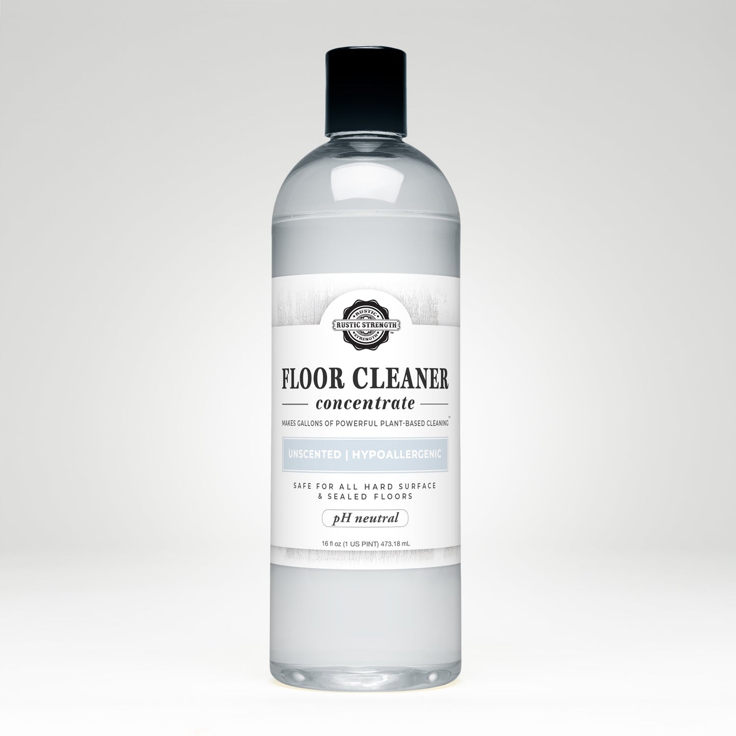A clear plastic bottle labeled Rustic Strength Floor Cleaner Concentrate | Unscented, featuring hypoallergenic, pH neutral, and non-toxic qualities, contains 16.9 fl oz of floor cleaner liquid set against a plain white background.