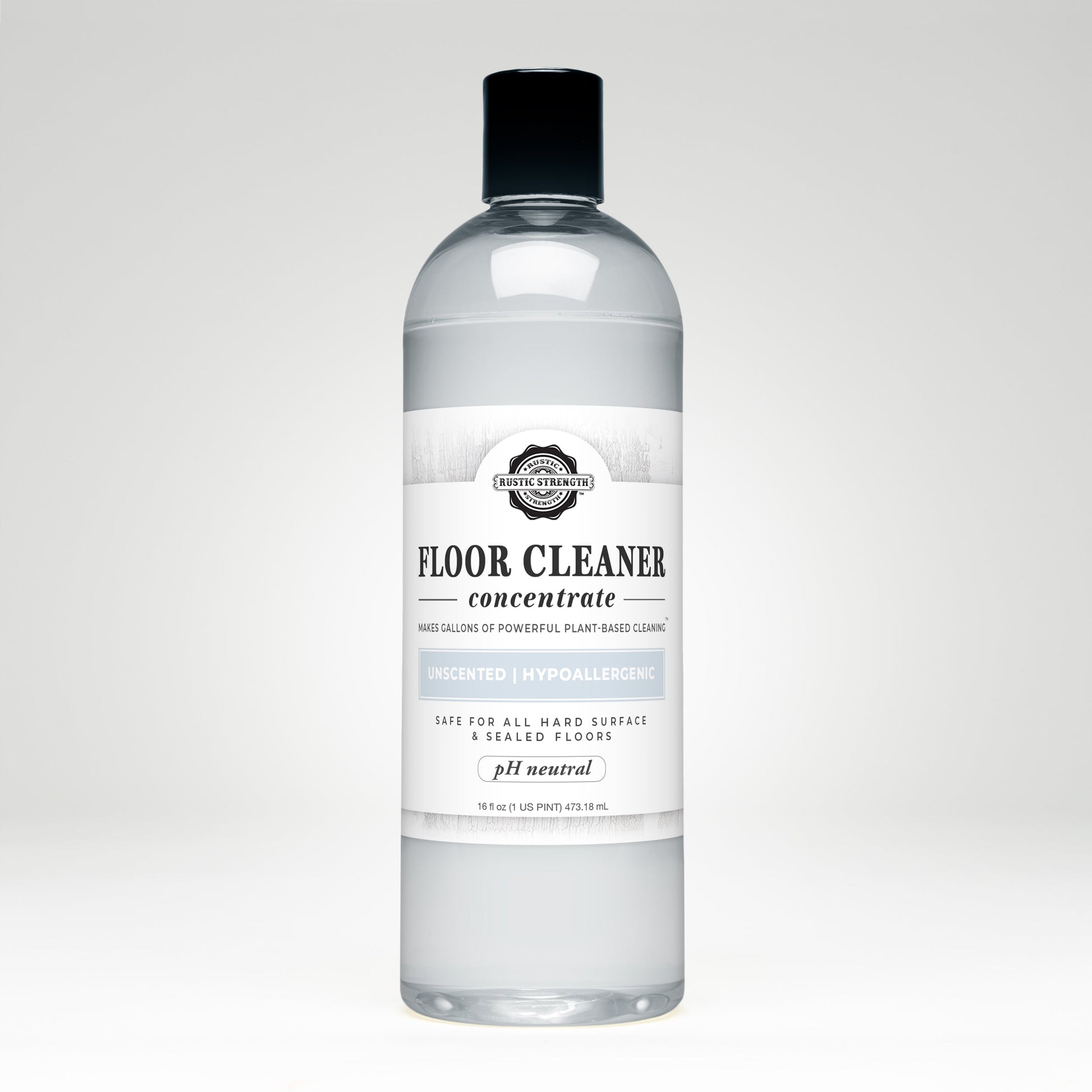 A clear plastic bottle labeled Rustic Strength Floor Cleaner Concentrate | Unscented, featuring hypoallergenic, pH neutral, and non-toxic qualities, contains 16.9 fl oz of floor cleaner liquid set against a plain white background.