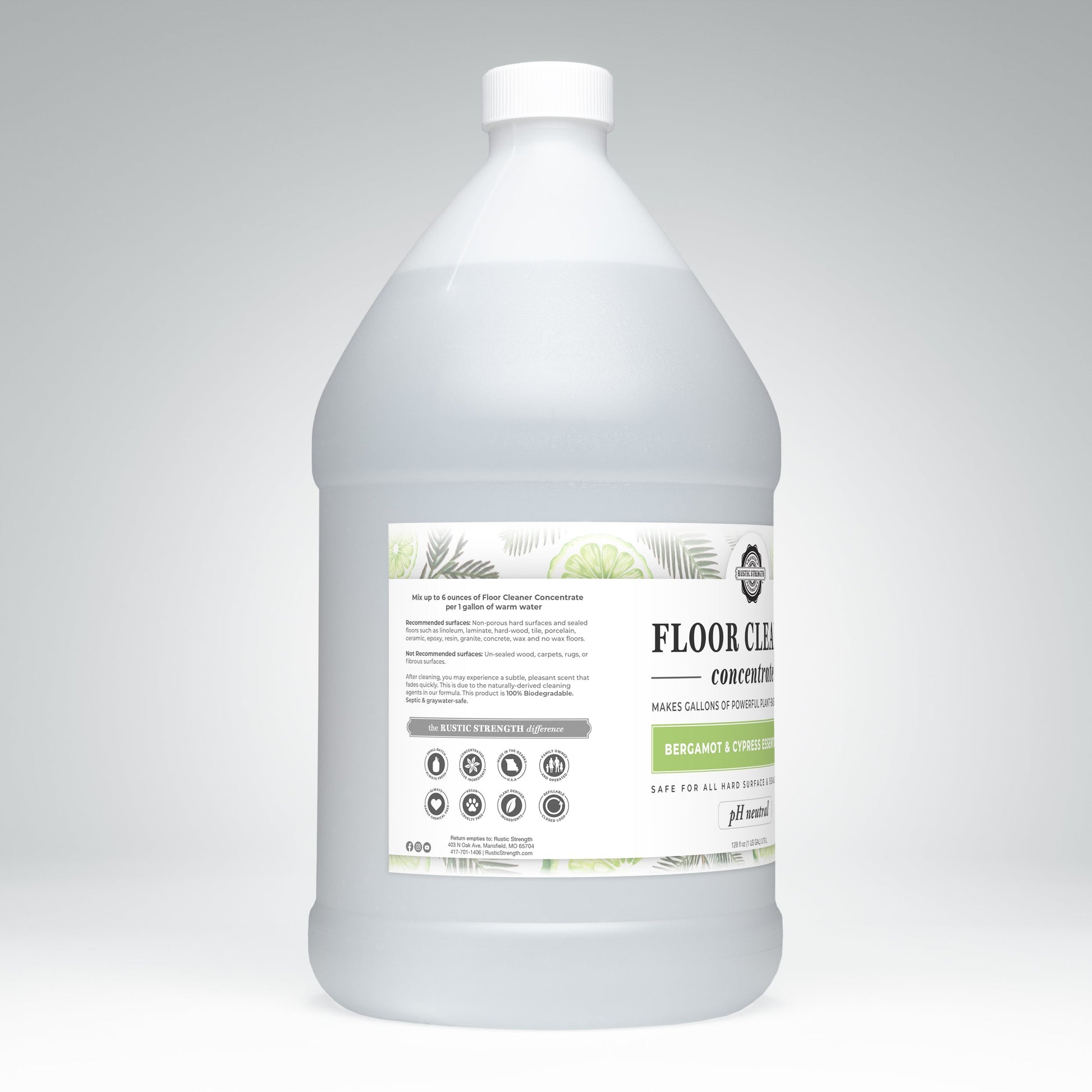 A large, translucent plastic gallon jug labeled Rustic Strength Floor Cleaner Concentrate | Bergamot & Cypress sits against a light gray background, displaying icons and instructions on the front.