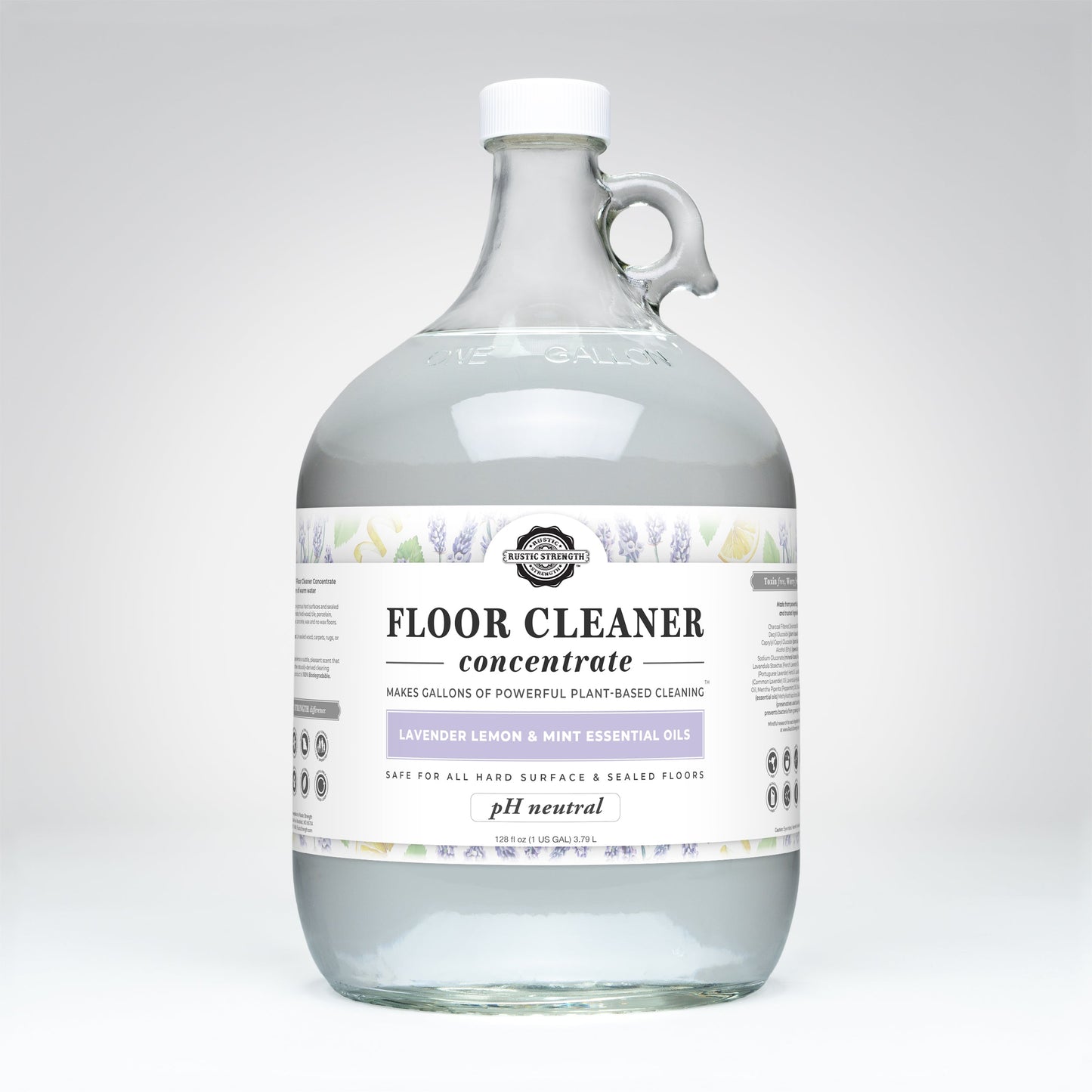 A clear gallon jug of Rustic Strength Floor Cleaner Concentrate | Lavender, Lemon & Mint features a white label with lavender and mint artwork, highlighting non-toxic ingredients, essential oils, and use on hard surfaces.