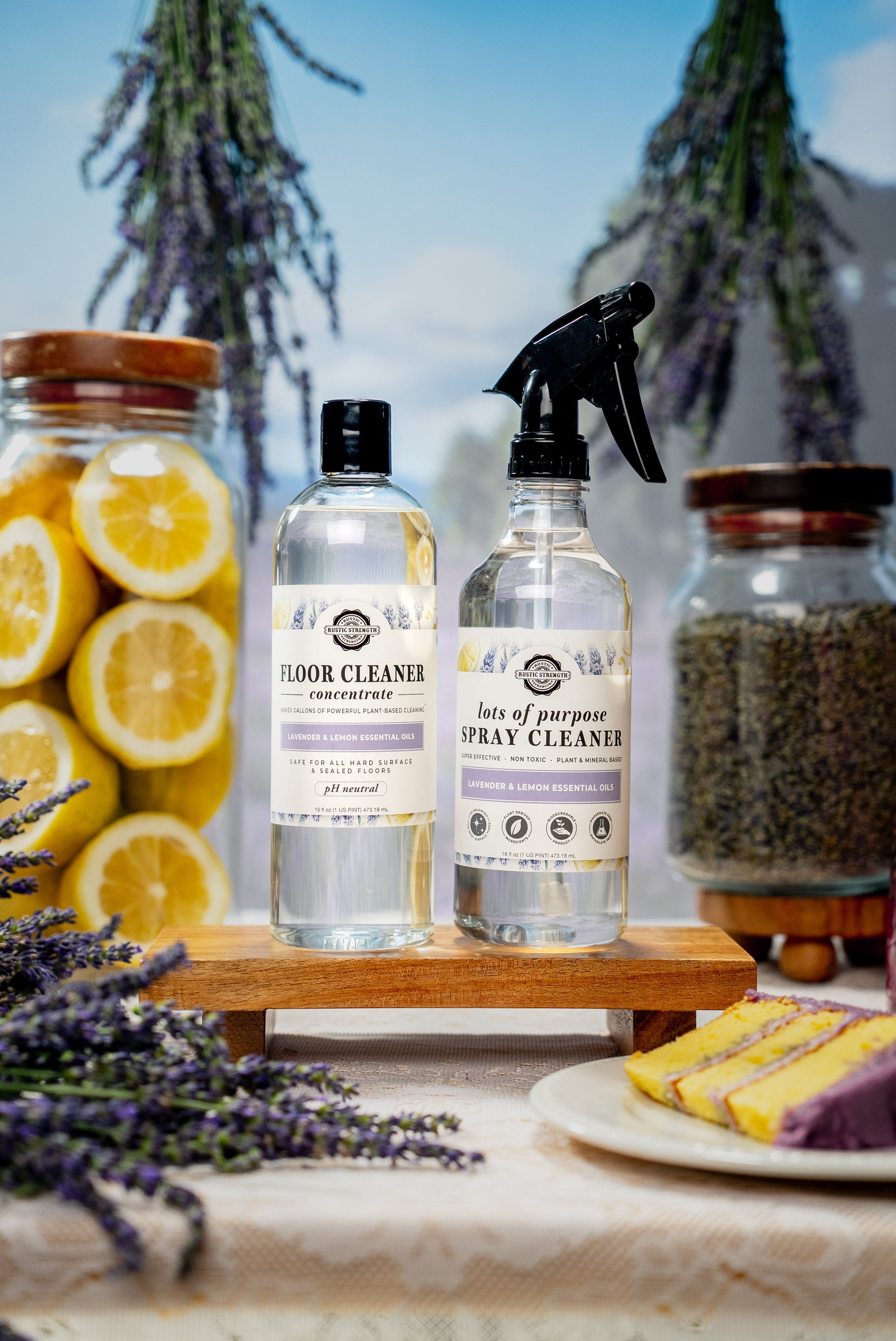 Rustic Strength Lavender & Lemon Multi-Purpose Floor Cleaner spray bottle with a spray nozzle and fresh lavender and lemon scent labels.