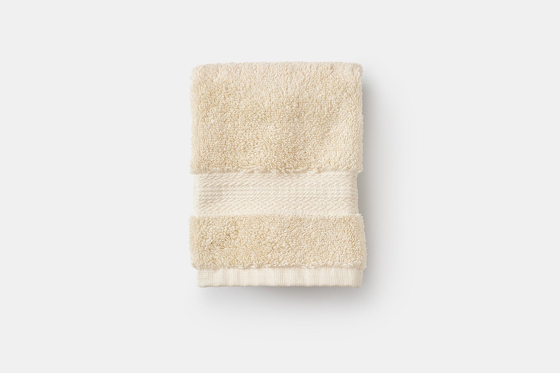 Folded luxury bathroom washcloths made of natural USA cotton by American Blossom Linens, soft and plush for everyday use.