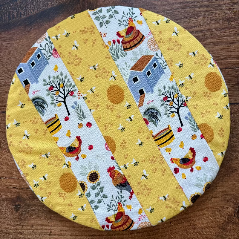 Medium bowl and banneton covers from Five Oaks Farm, natural fabric with rustic stitching for bread proofing and dough rising.