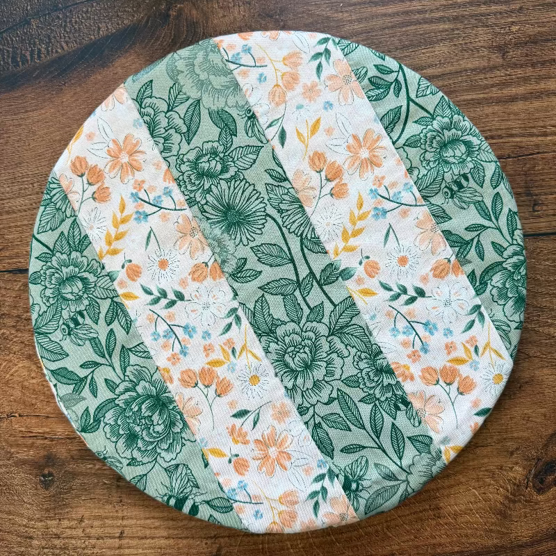 Medium bowl and banneton covers from Five Oaks Farm, farm-style baking accessories with fabric covers and wooden bowl.