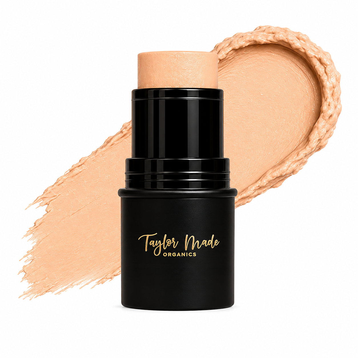 Taylor Made Organics cream highlighter stick in golden glow, with smooth, luminous texture and sleek packaging.