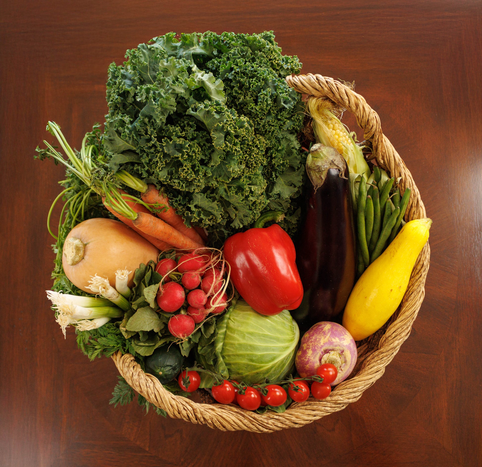 Heirloom vegetable seed kit from Heaven's Harvest, featuring colorful seeds for planting vegetables at home.