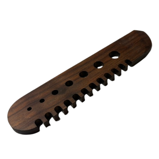 Walnut wood herb comb by Quailz.com, showing a handcrafted herbal comb with smooth teeth for grooming herbs.