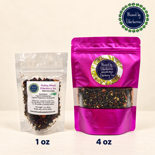 Blessed by Elderberries Healing Blend Elderberry Tea in a teacup, showcasing fresh elderberries and herbs in a cozy setting.