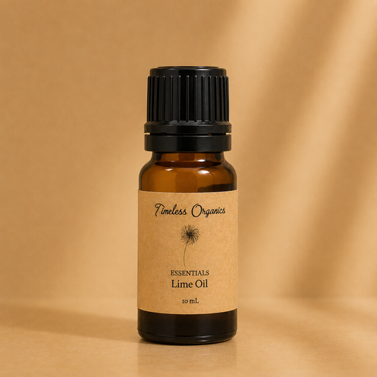 Amber glass bottle of Timeless Organics Skin Care Lime Oil with black screw cap and beige label on a gold background.