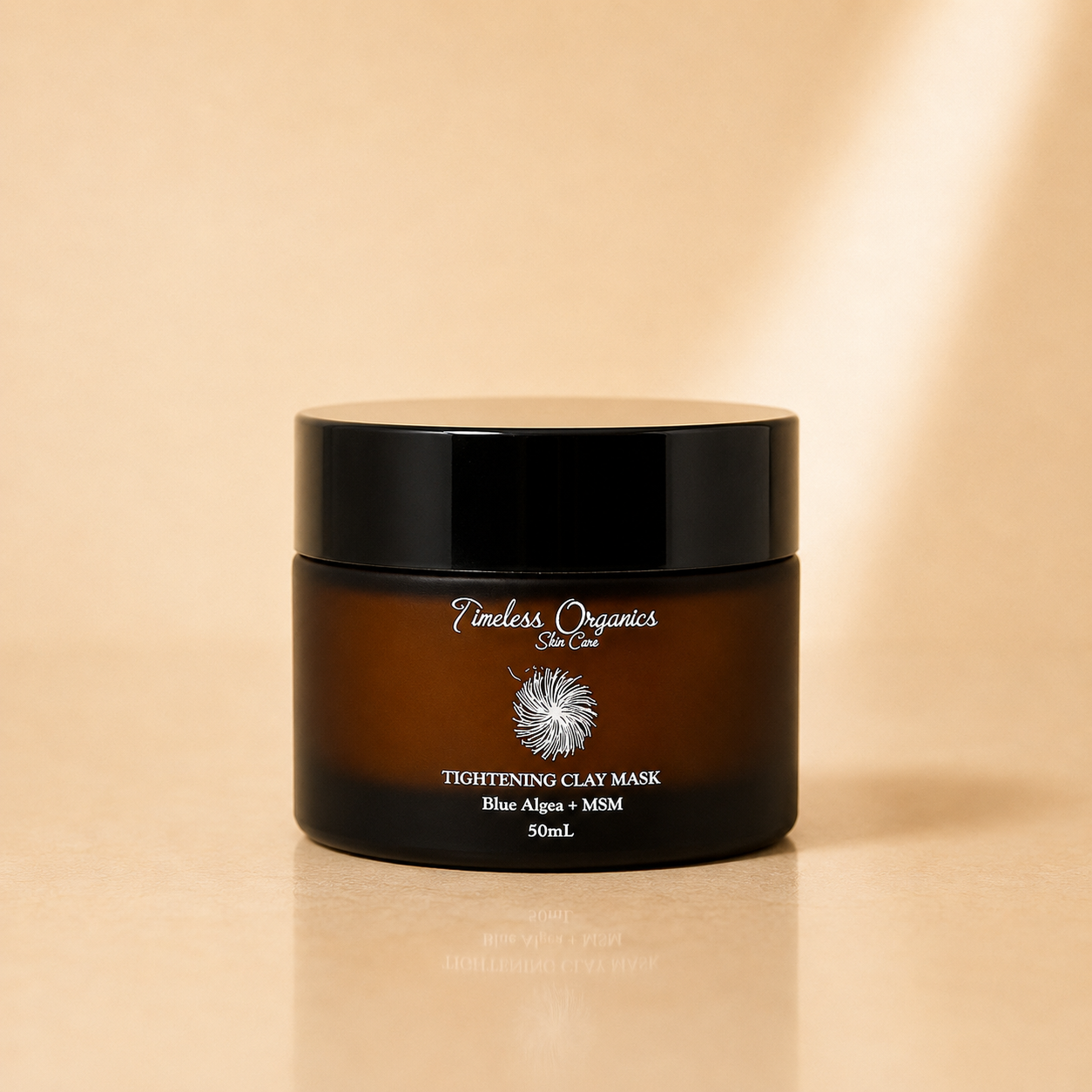 Timeless Organics Skin Care tightening clay mask applied on face, soothing and revitalizing skin with natural clay ingredients