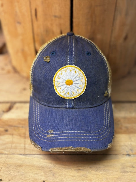Daisy distressed mesh snapback baseball cap by The Goat Stock featuring a floral design and adjustable strap.