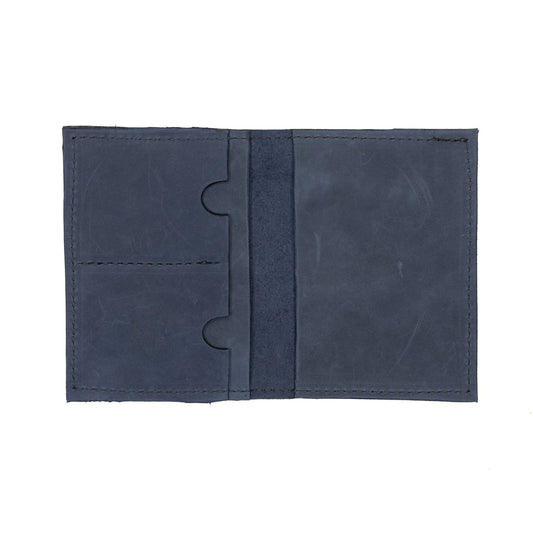 Navy passport wallet by Rebekah Scott Designs with multiple card slots and a secure compartment for travel documents.