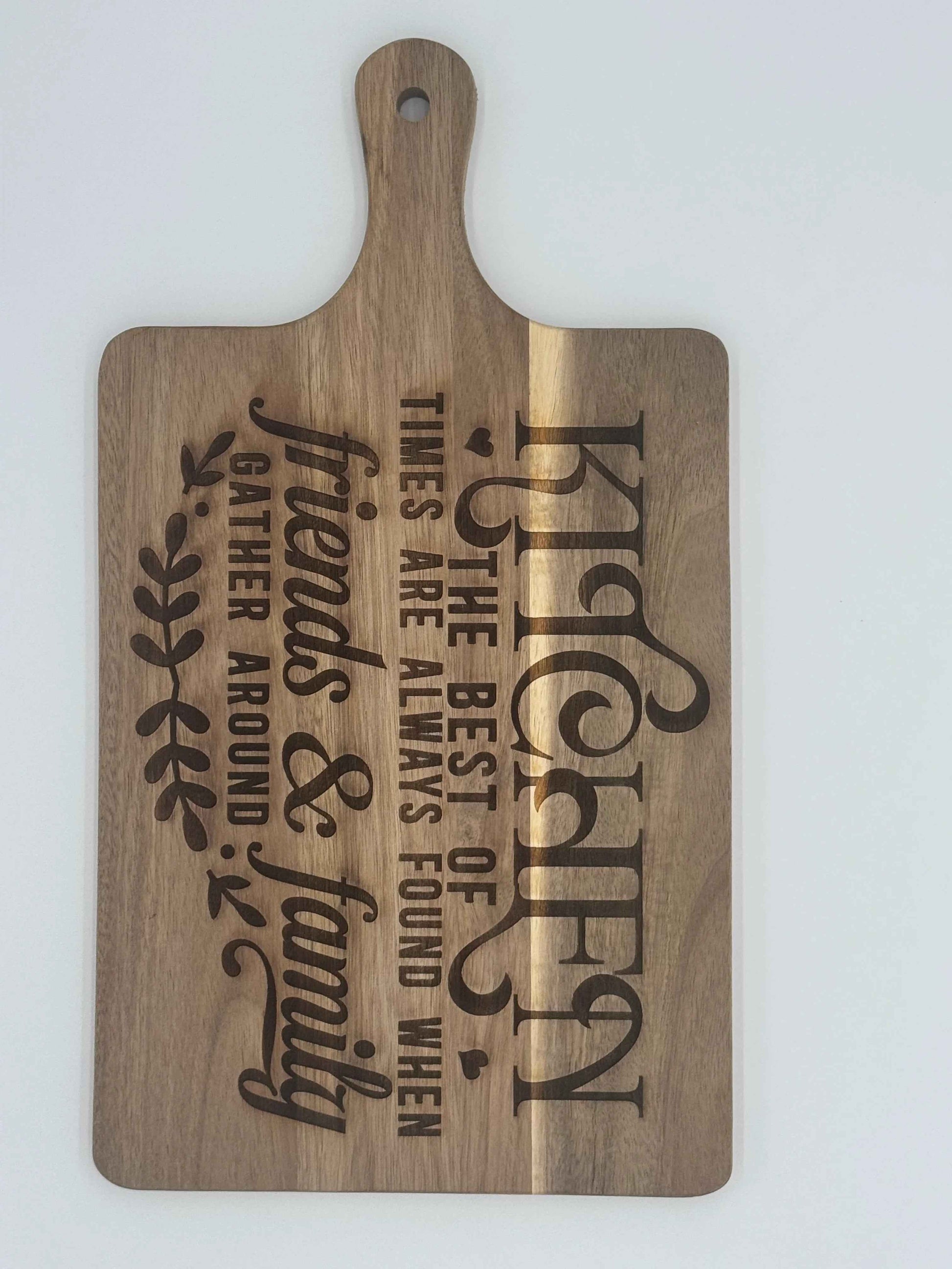 Personalized wooden cutting board from C2 Creations LLC, showing a custom engraved design ideal for serving and kitchen use.
