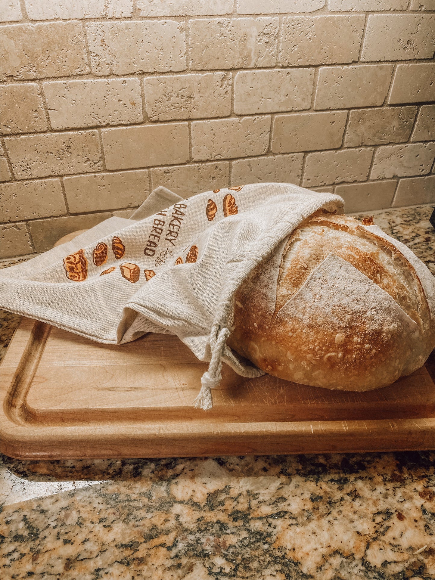 Onic Brands Bread Bag, durable fabric storage bag with Onic Brands LLC logo, designed for fresh bread storage.