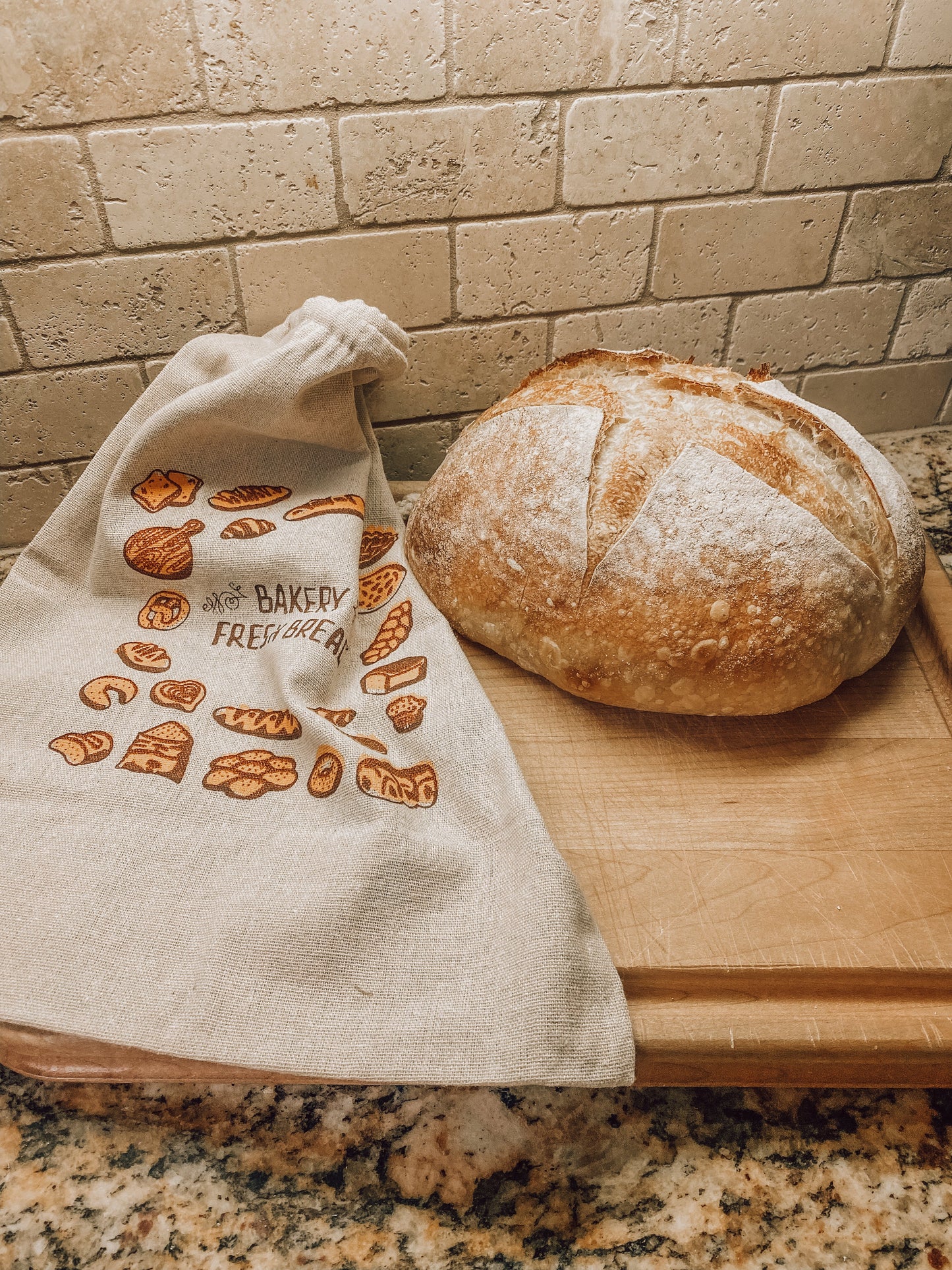 Onic Brands LLC bread bag for bakery merchandise, shown with fabric material and branding details.