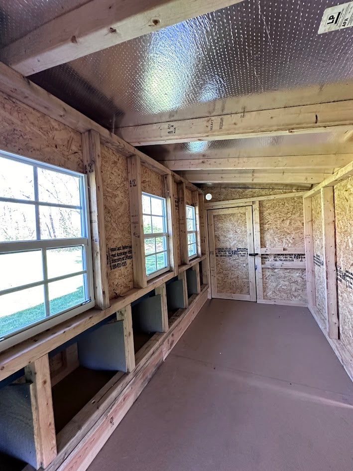 OverEZ XL chicken coop for up to 20 chickens, featuring a spacious design, nesting boxes, and secure outdoor enclosure.