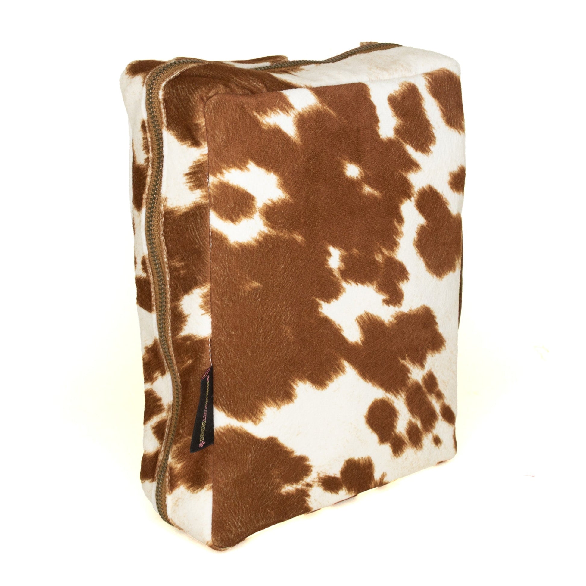 Rebekah Scott Designs longhorn cowhide Bible cover with natural leather texture and detailed stitching.