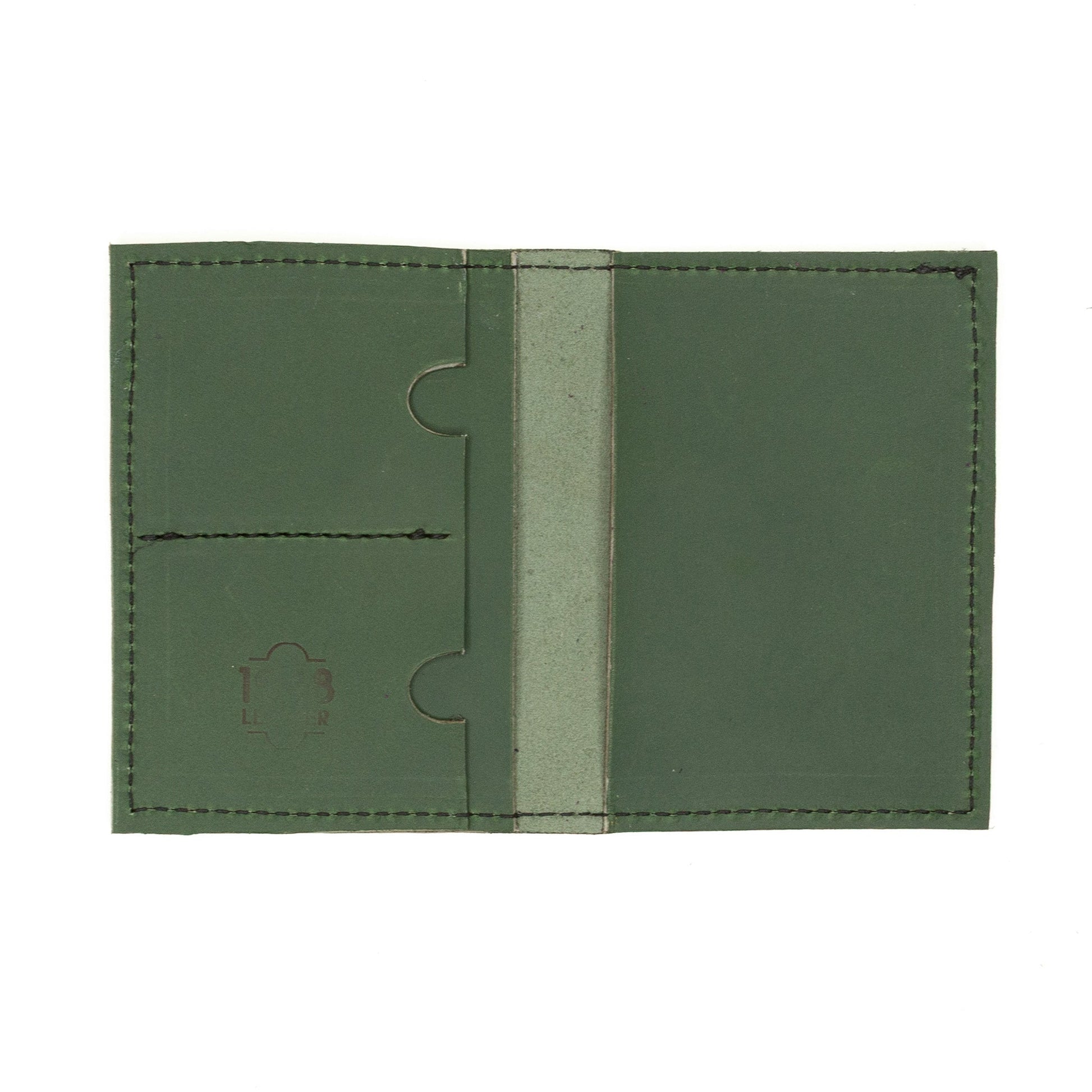 Rebekah Scott Designs Pine passport wallet with multiple card slots and secure zipper closure, made from durable leather.