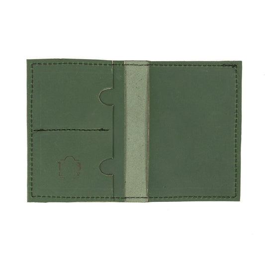 Rebekah Scott Designs Pine passport wallet with multiple card slots and secure zipper closure, made from durable leather.
