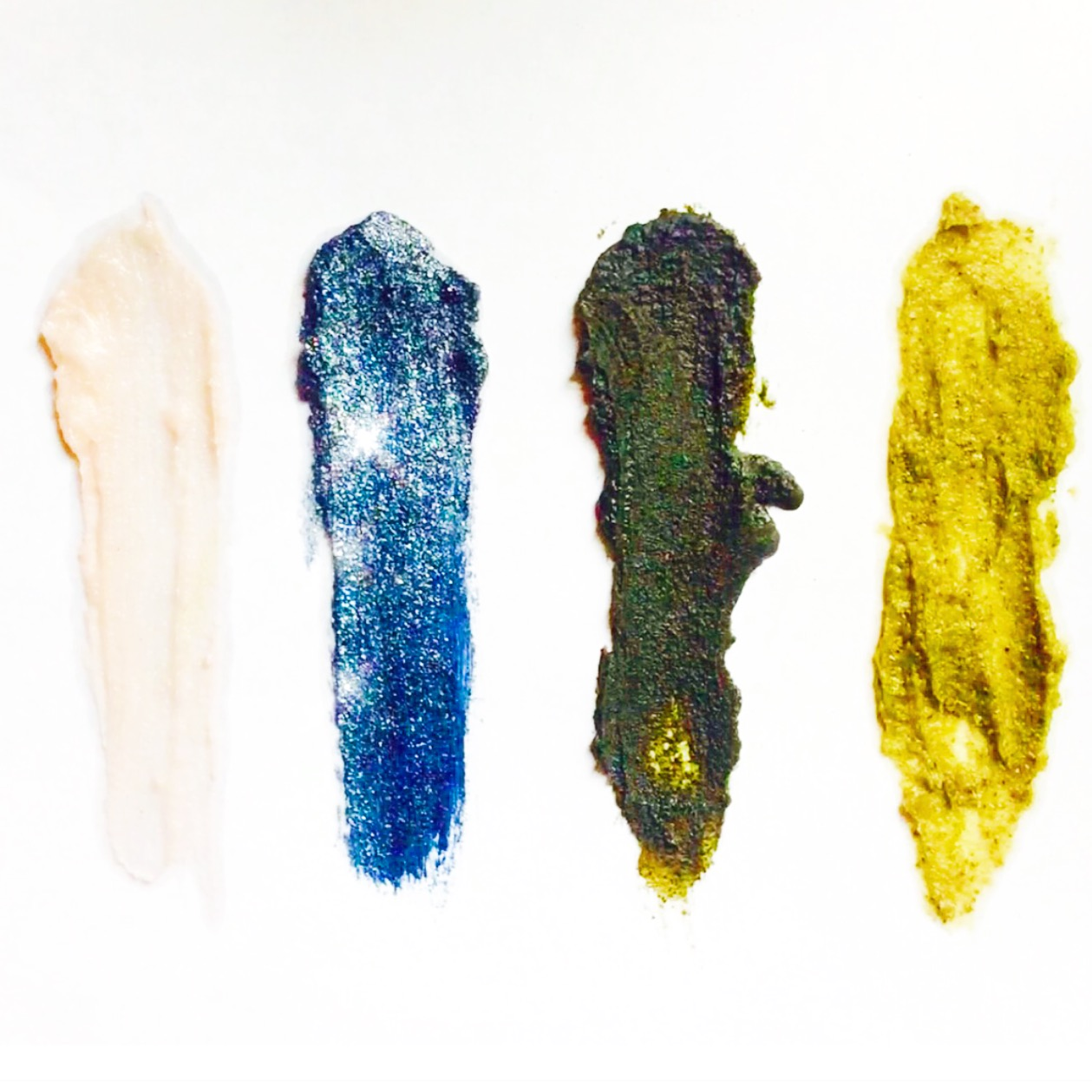 Space Goth Gloss by plant makeup with a sleek, shiny black finish and cosmic-inspired packaging.