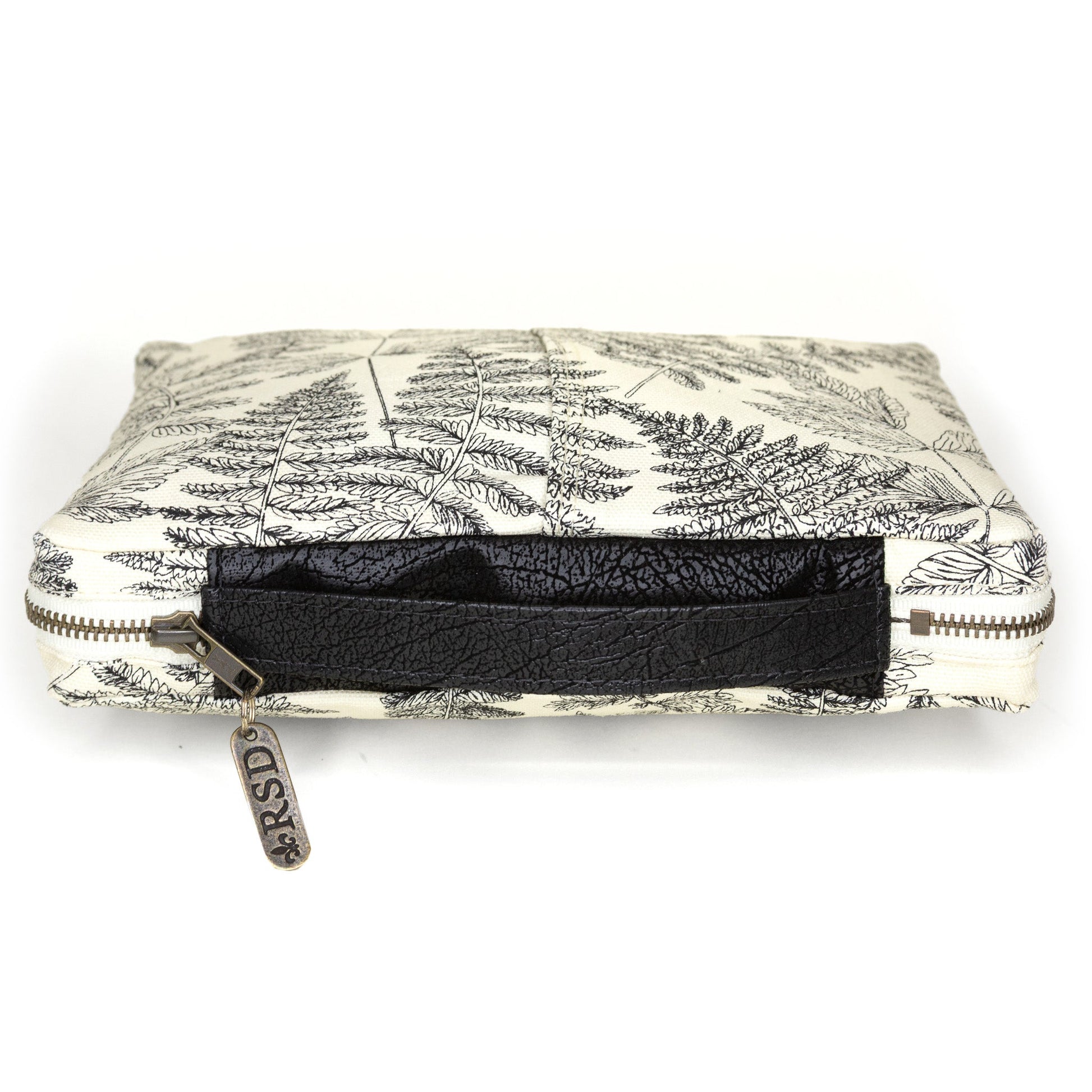 Slim Rebekah Scott Designs Bible cover featuring an airplane design, made to protect and carry your Bible stylishly.