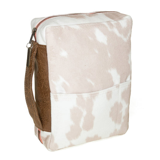 Blush cowhide Bible cover by Rebekah Scott Designs with a soft, textured leather finish and secure closure.