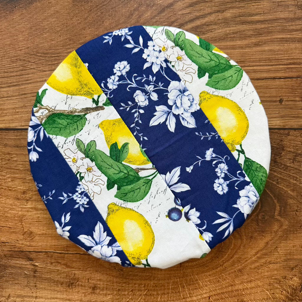 Small farm-style bowl and banneton covers from Five Oaks Farm, featuring woven fabric and rustic design for bread proofing.