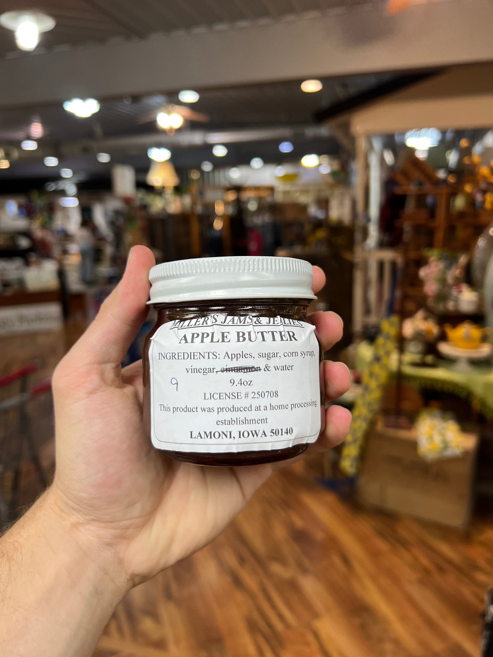 Amish Country Store Miller's Apple Butter jar showcasing smooth, golden apple jam with Amish-made quality.