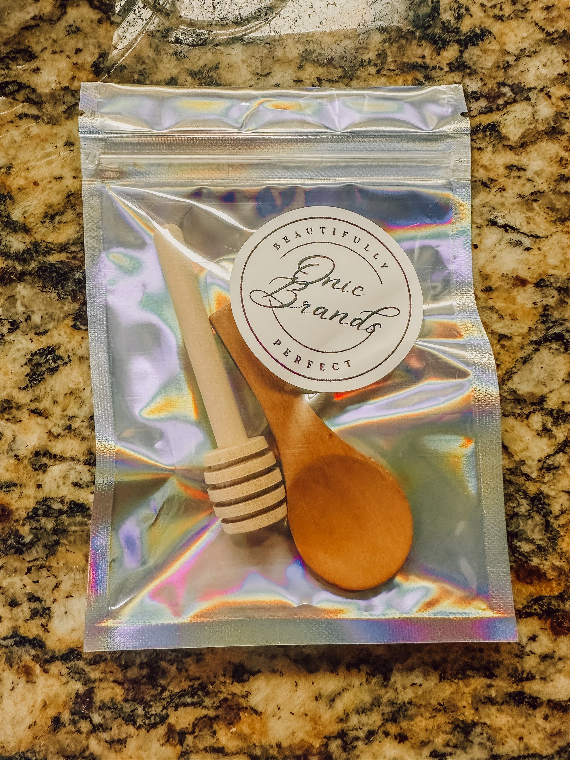 Jar of honey duo from Onic Brands LLC showing two glass honey jars with golden honey inside.