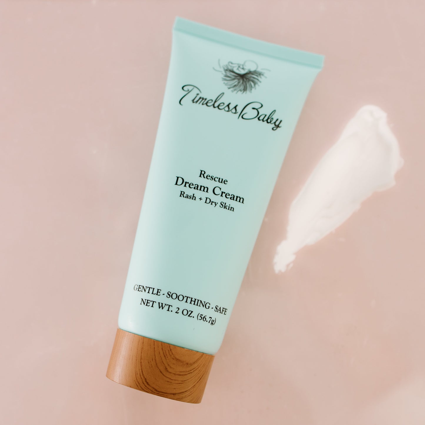 A jar of Timeless Organics Dream Cream skincare product with a white lid and label, surrounded by soft, calming background elements.