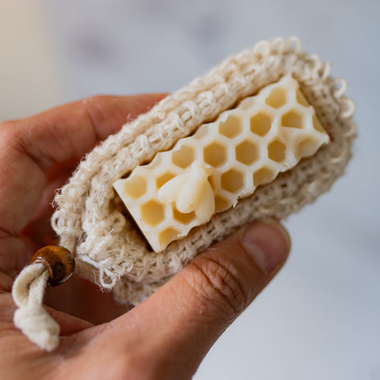 Farmhouse soap sack from Five Oaks Farm, natural linen bag with soap inside, rustic and eco-friendly soap storage solution.