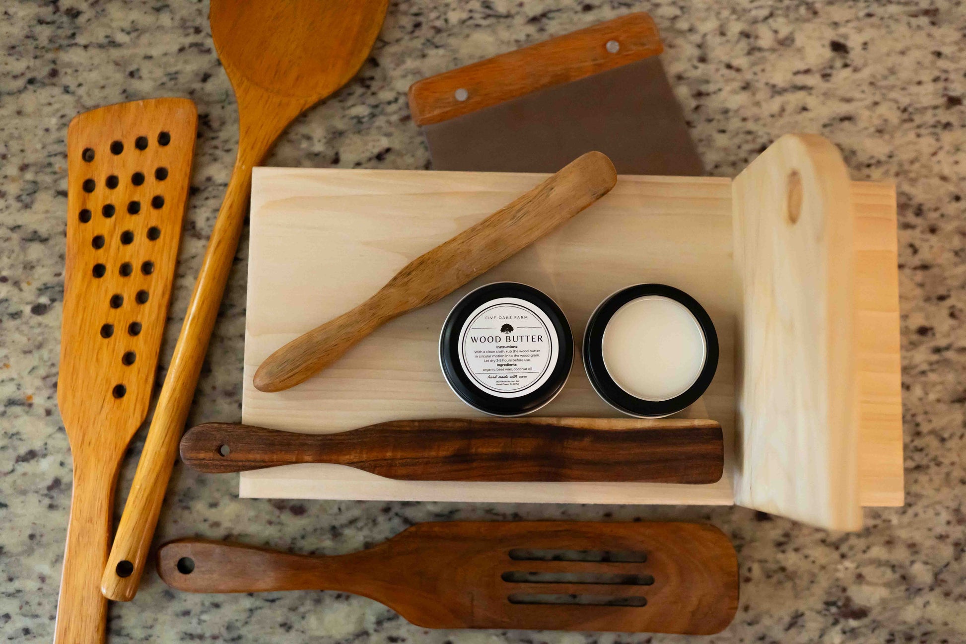 Natural wood butter from Five Oaks Farm, showcasing a jar of nourishing wood treatment with a rustic label and wooden accents.