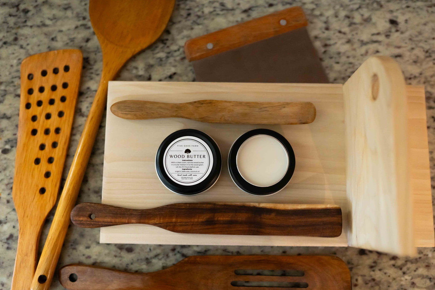 Five Oaks Farm wood butter jar with rustic label and wooden lid, used for nourishing and protecting wooden surfaces.