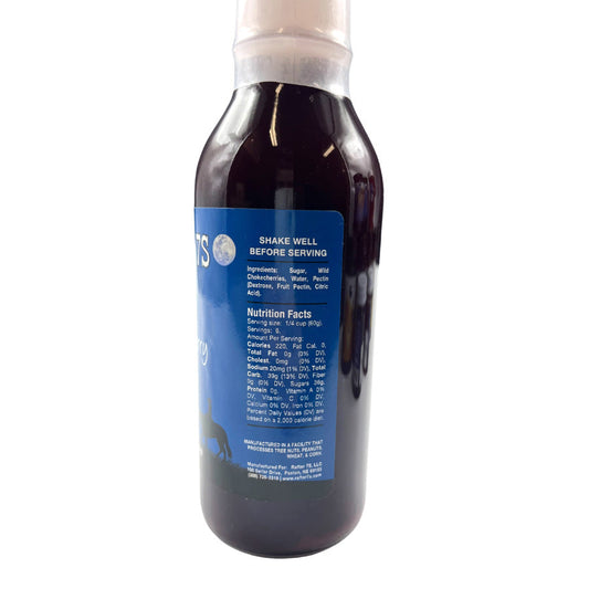 Wild chokecherry syrup in a 12 oz jar from Rafter 7S, showcasing the rich, dark syrup with a rustic label.