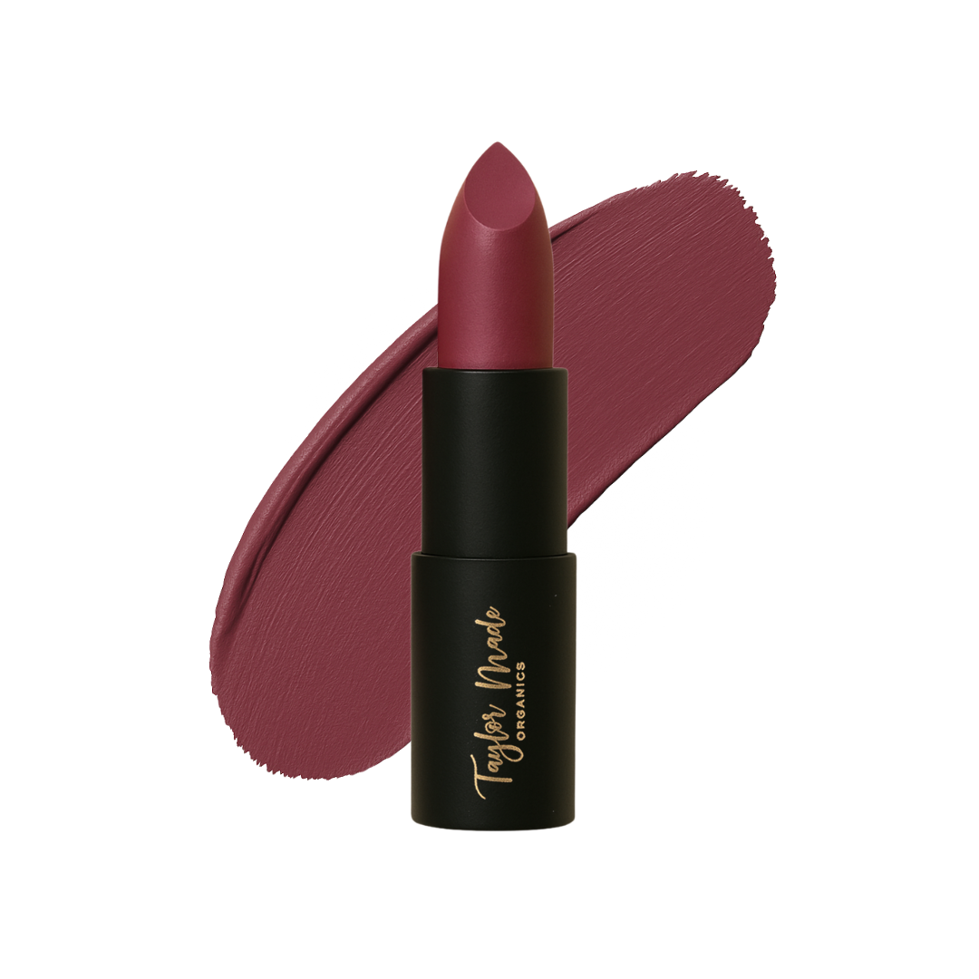 Organic Taylor Made Organics lipstick in a sleek tube, featuring a vibrant color and natural finish.