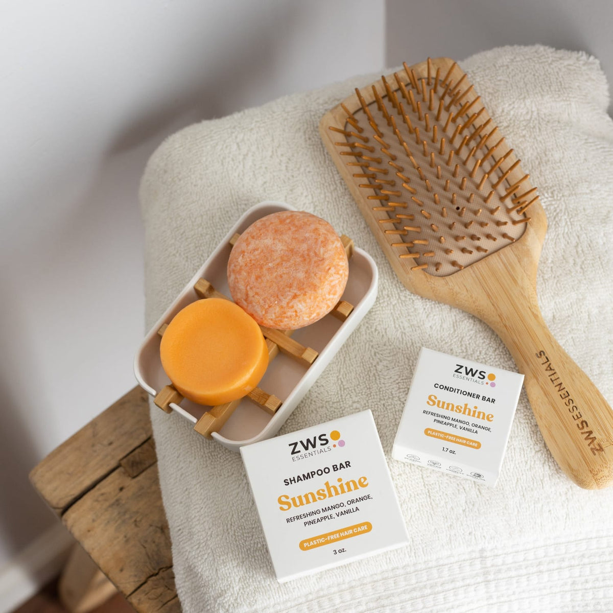 Bamboo soap dish from ZeroWasteStore.com with a slotted design for holding soap in a natural bathroom setting.