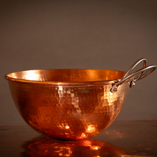 Set of three Sertodo copper mixing bowls, shiny and smooth, stacked together for baking and cooking prep.