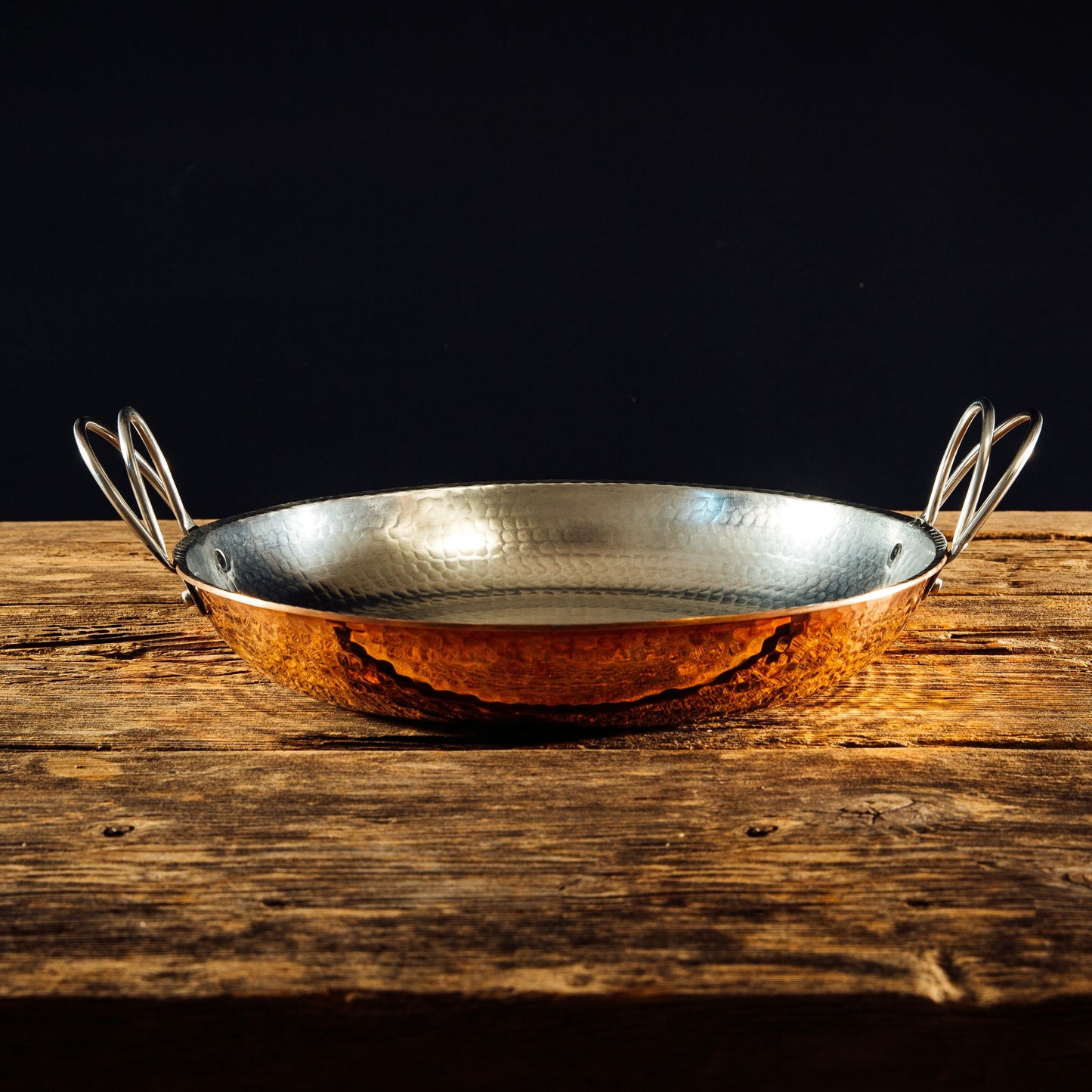 Alicante Copper Paella Pan by Sertodo with new handles, showing a wide, shallow copper cookware ideal for preparing traditional paella.