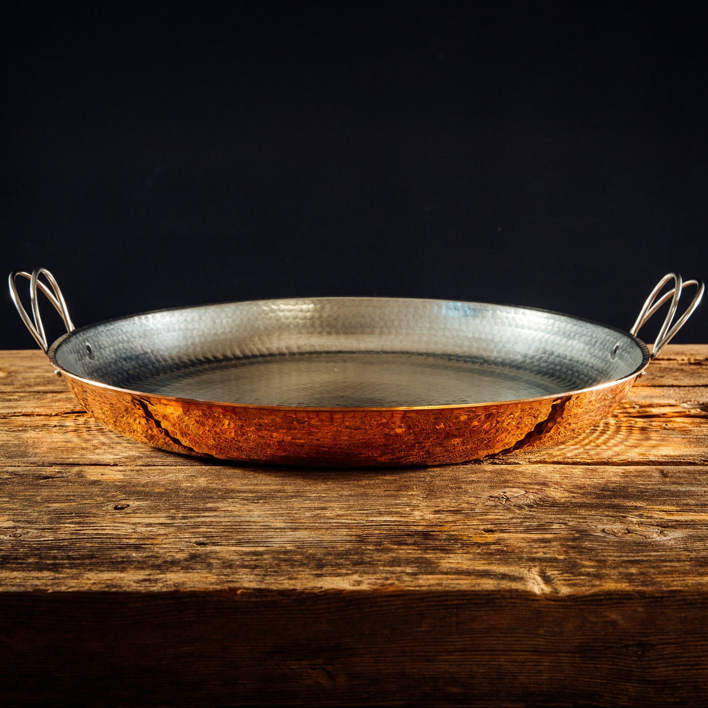 Alicante Copper Paella Pan by Sertodo with wide, shallow design and polished copper finish for authentic Spanish cooking.