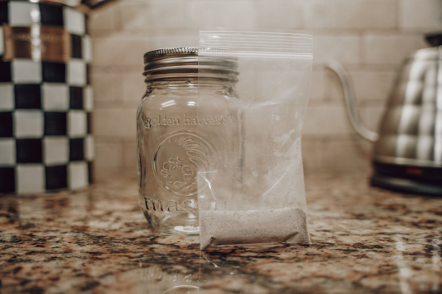 Dehydrated sourdough starter from Onic Brands LLC, shown in a clear jar with dry, powdered sourdough mix for baking.