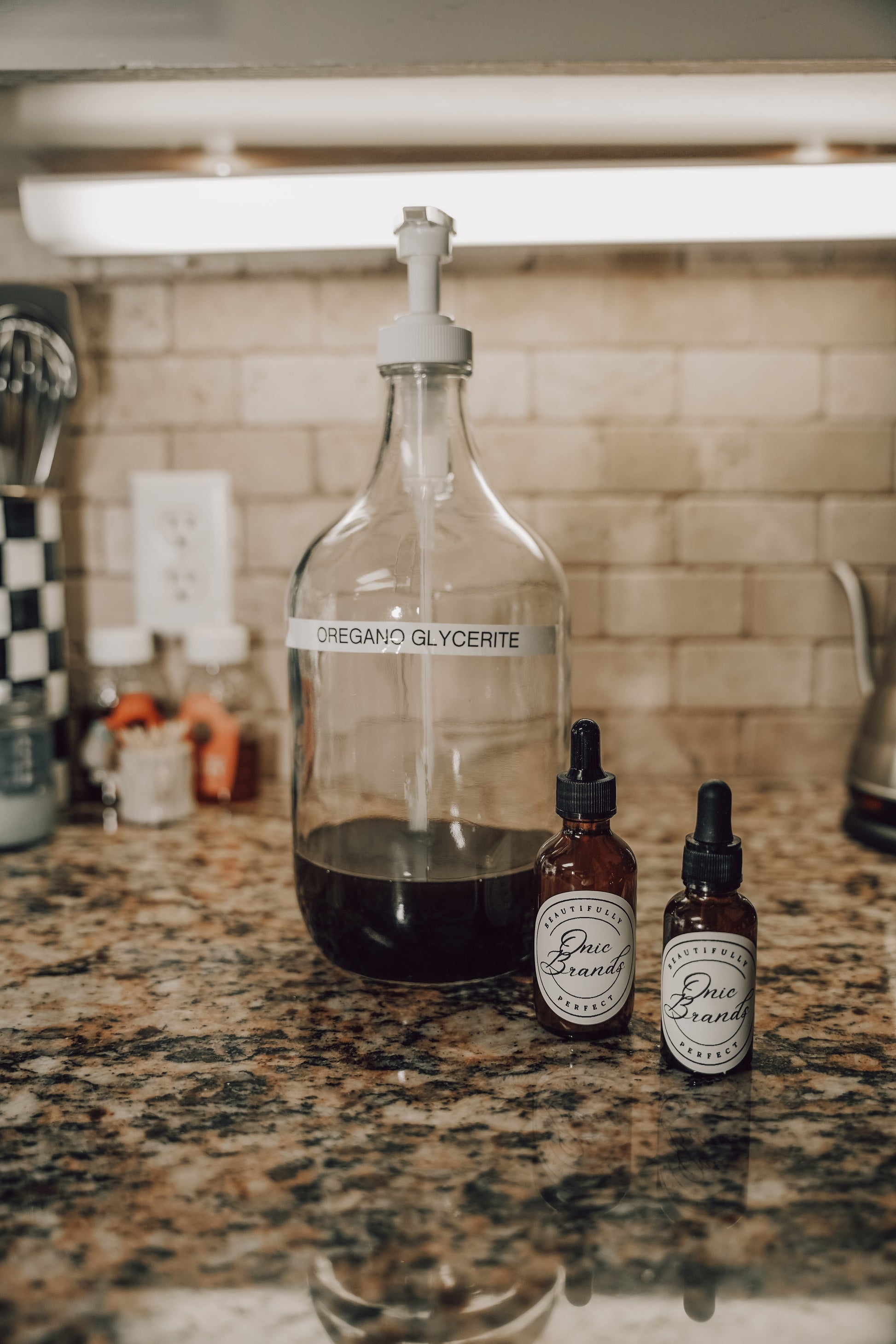 Onic Brands Elemental Oregano Glycerite Tincture bottle with dropper, herbal supplement for natural health support.