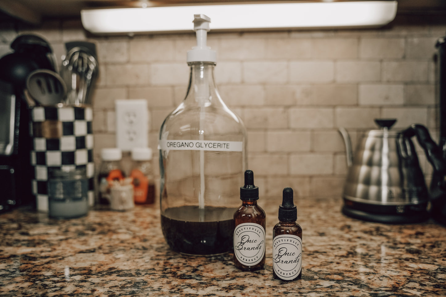 Onic Brands Elemental Oregano Glycerite Tincture bottle with label, natural herbal supplement for wellness.