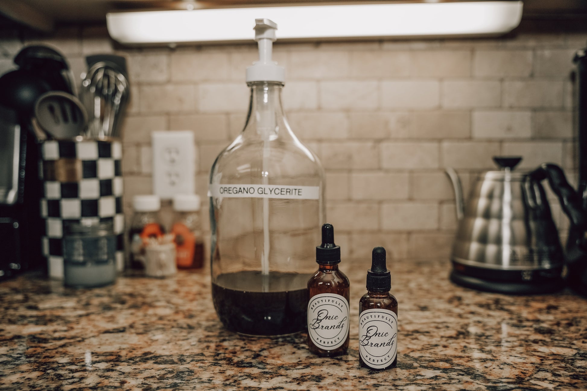 Onic Brands Elemental Oregano Glycerite Tincture bottle with label, natural herbal supplement for wellness.