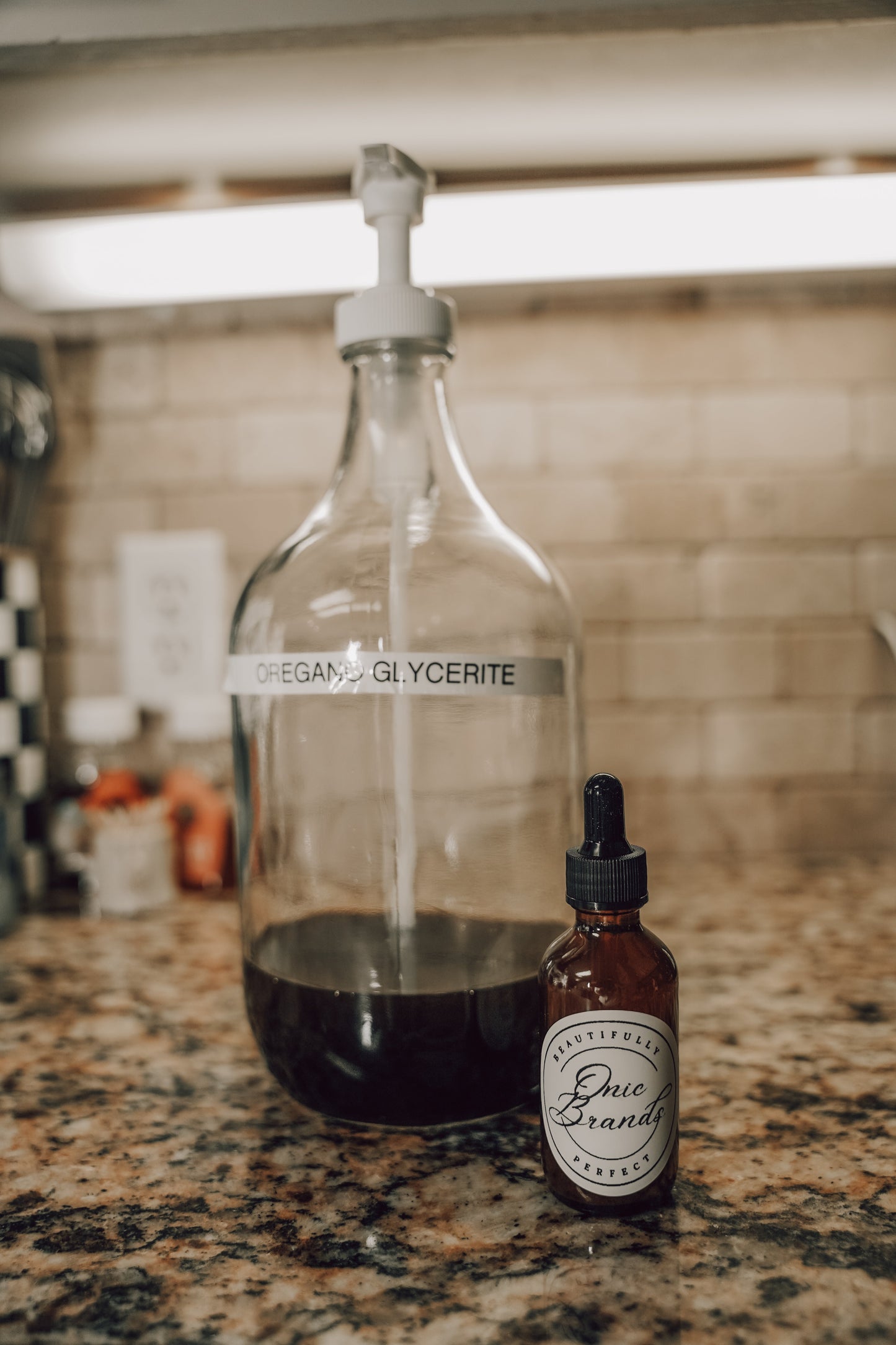 Onic Brands Elemental Oregano Glycerite tincture bottle with dropper cap, herbal supplement for natural health support.
