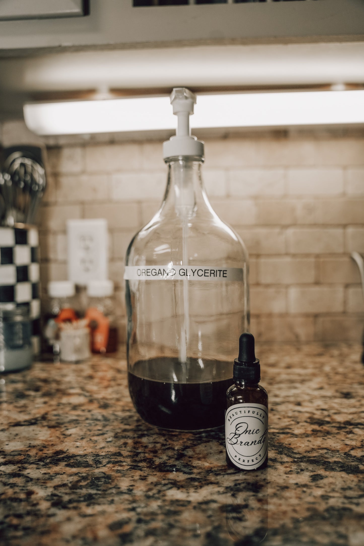 Onic Brands Elemental Oregano Glycerite Tincture bottle with dropper, herbal supplement for natural health support.